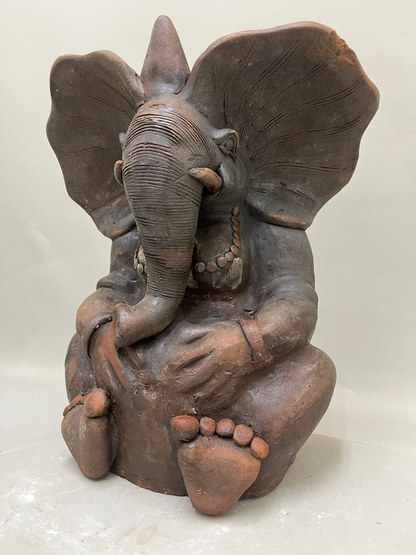 Restauratie roodgebakken klei Ganesha