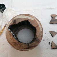 Schade aan archeologische Pot 3.jpeg